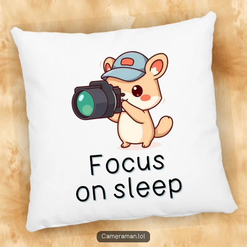Funny animal character, wearing a jaunty cap, points a camera off-screen, on a plush pillow.